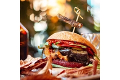 Image Essento cricket burger at restaurant.